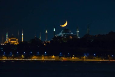 Ayasofya ve Hilal Ay. Ramazan, iftar, kandil, kadir gecesi (laylat al-qadr), İslami yeni yıl, Kurban Bayramı arkaplan fotoğrafı.