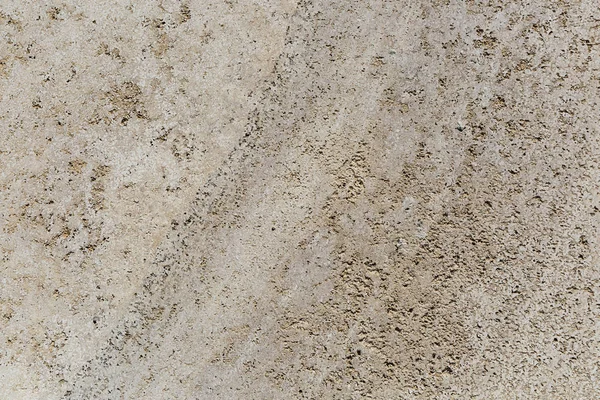 Béžový travertin textury abstraktní jako pozadí. Přírodní kámen. — Stock fotografie