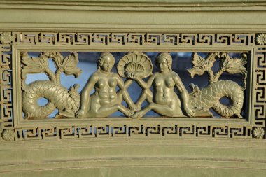 Saint Petersburg, Russia. A fragment of the fence of Anichkov bridge with the mermaids. clipart