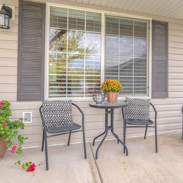 Square Front veranda of modern home and outdoor furniture