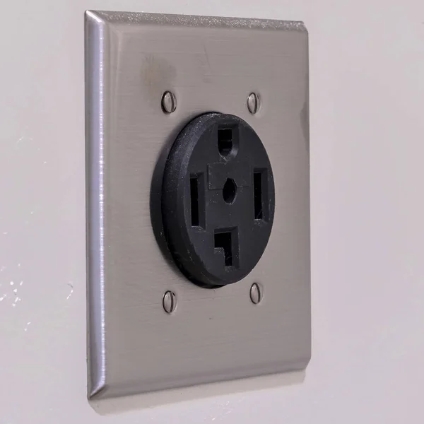 Square frame Electrical connection for a washing machine on white wall — Stock Photo, Image