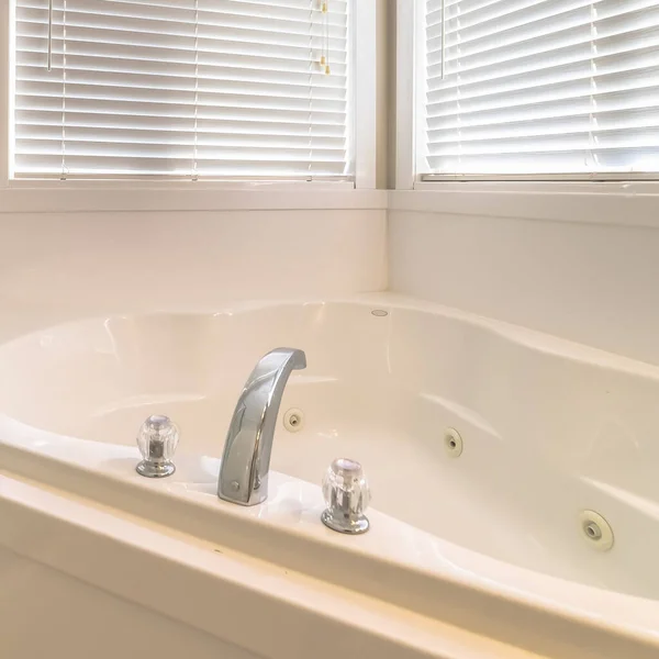 Square Clean bathroom interior of a home with shower stall adjacent to the bathtub — Stock Photo, Image