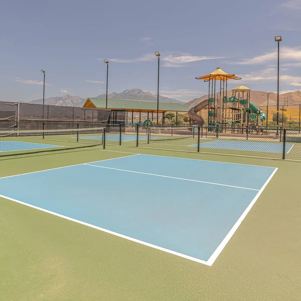 Square All weather green and blue pickleball court