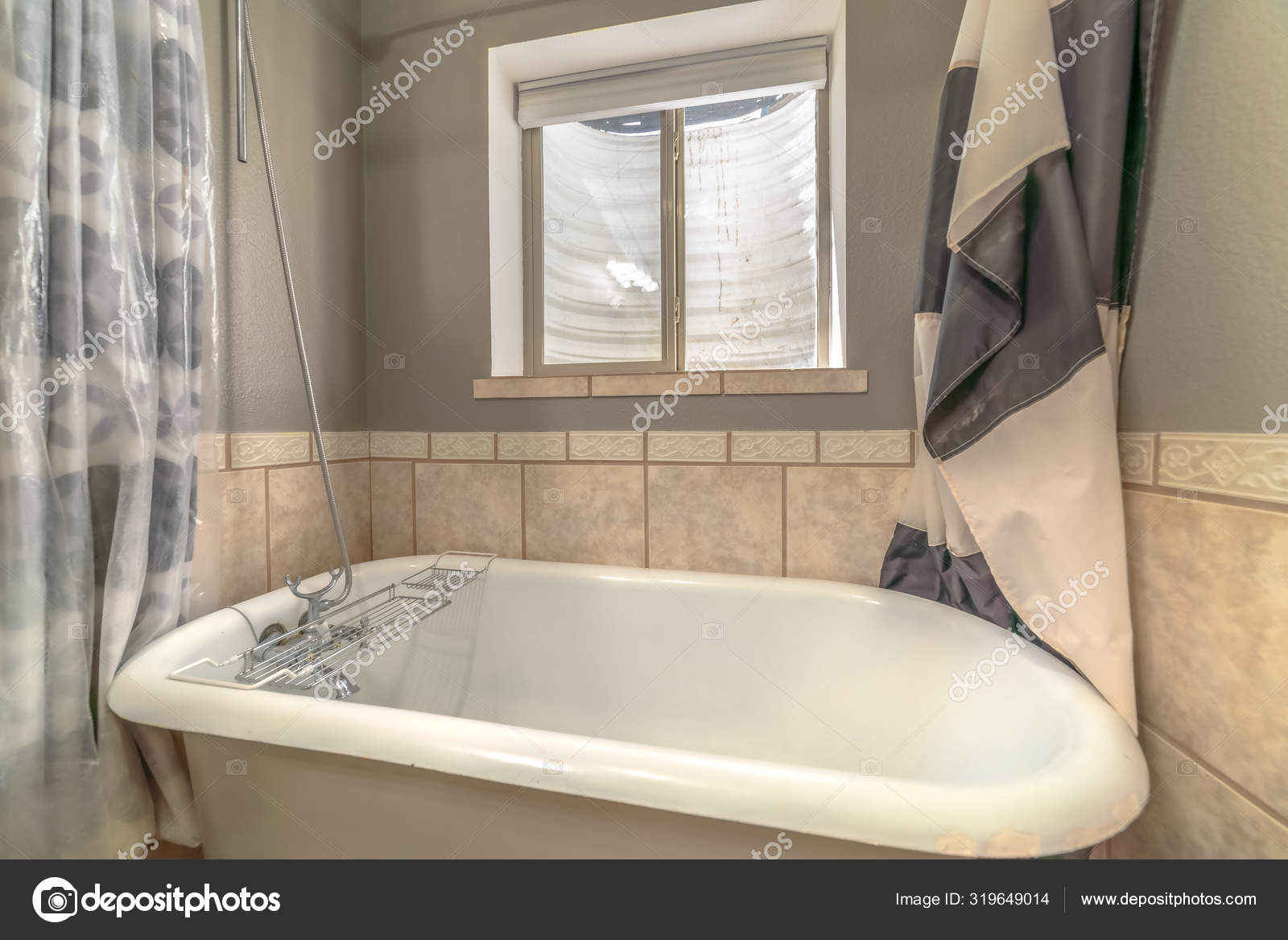 bathtub with shower curtain