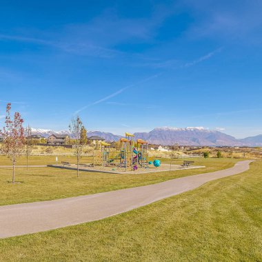 Square Long empty pedestrian walkway in an urban park