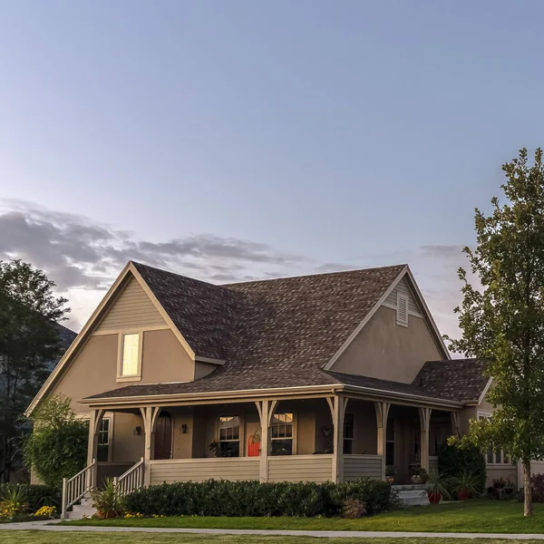 Square Suburban homes in American neighbourhood near sunset