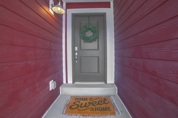 Entrance door with Home Sweet Home mat