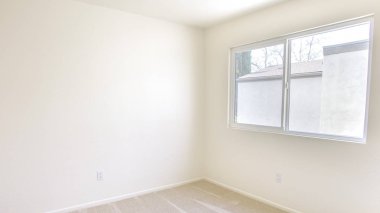 Panorama frame Empty bedroom with carpet and view outside of window