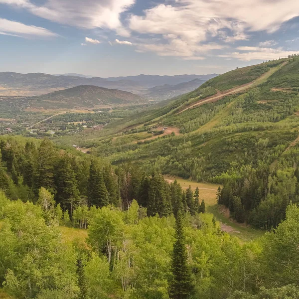 Square Hiking trails and green trees on a ski resort mountain in Park City in summer — ストック写真