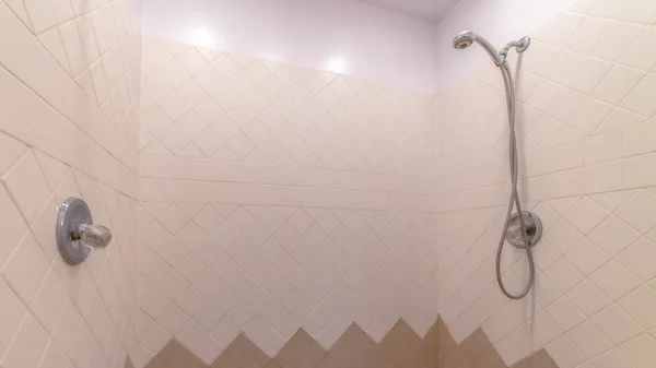 Pano frame Bathroom interior with shower installed on the wall with white and brown tiles — ストック写真