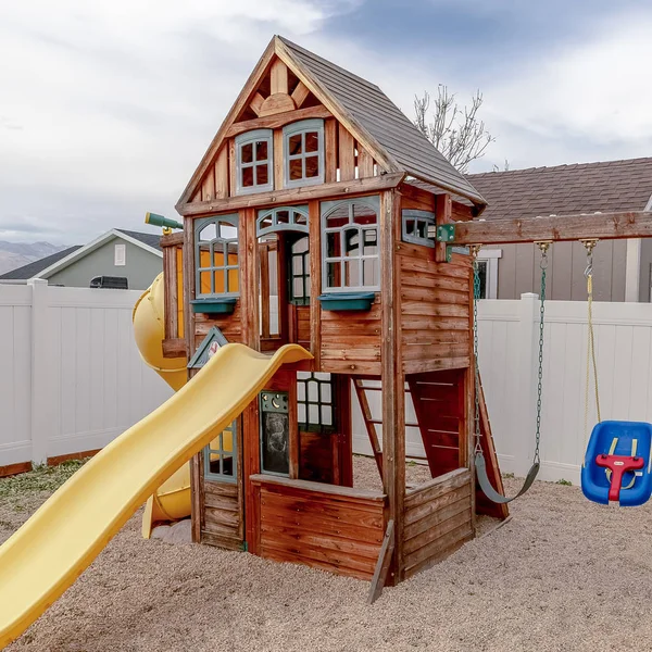 Square frame Small private Wendy house and kids playground — Stockfoto