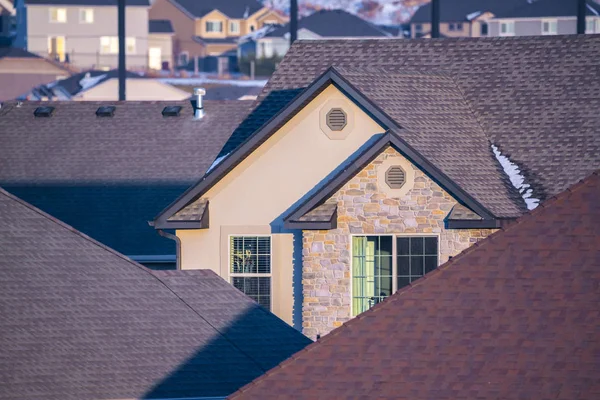 Roofs and gables of American houses in winter