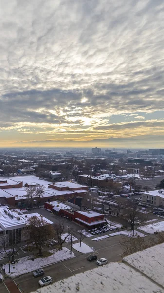 Vertical Panorama rooftop view of Salt Lake City with snow