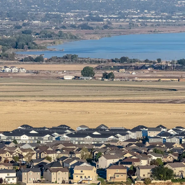 Square Aerial view of Utah Lake and housing estate