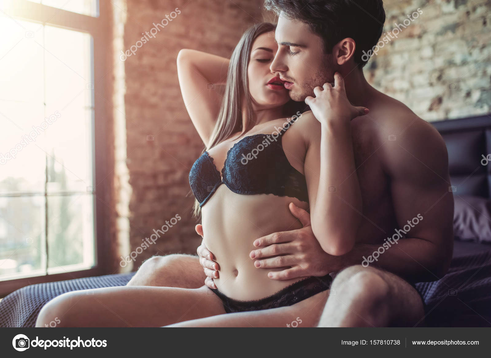 Couple Having Sex On Bed