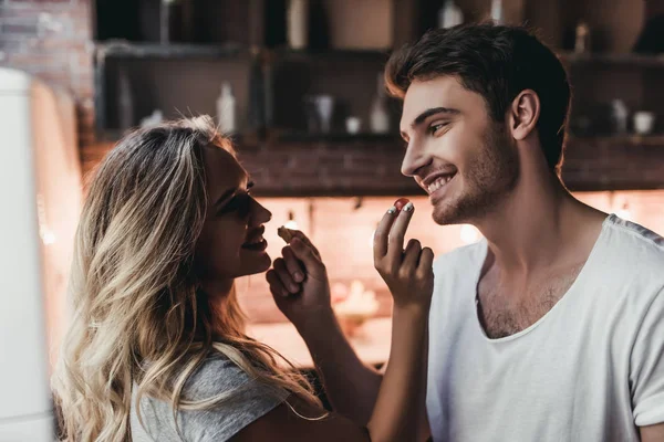 Couple on kitchen — Stock Photo, Image