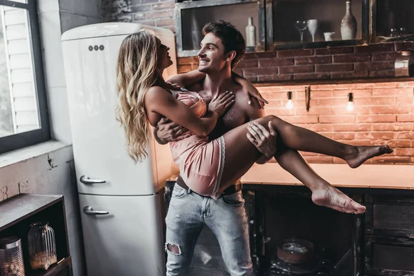 Couple on kitchen — Stock Photo, Image