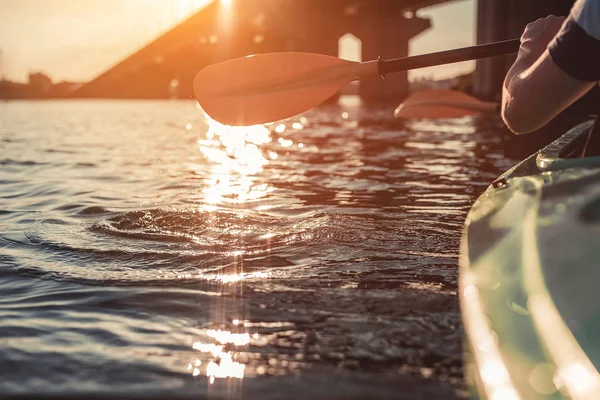 Man kayaking on sunset — Stock Photo, Image