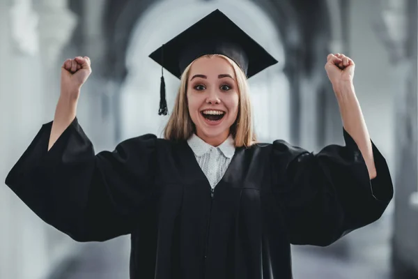 Female graduate in university — Stock Photo, Image