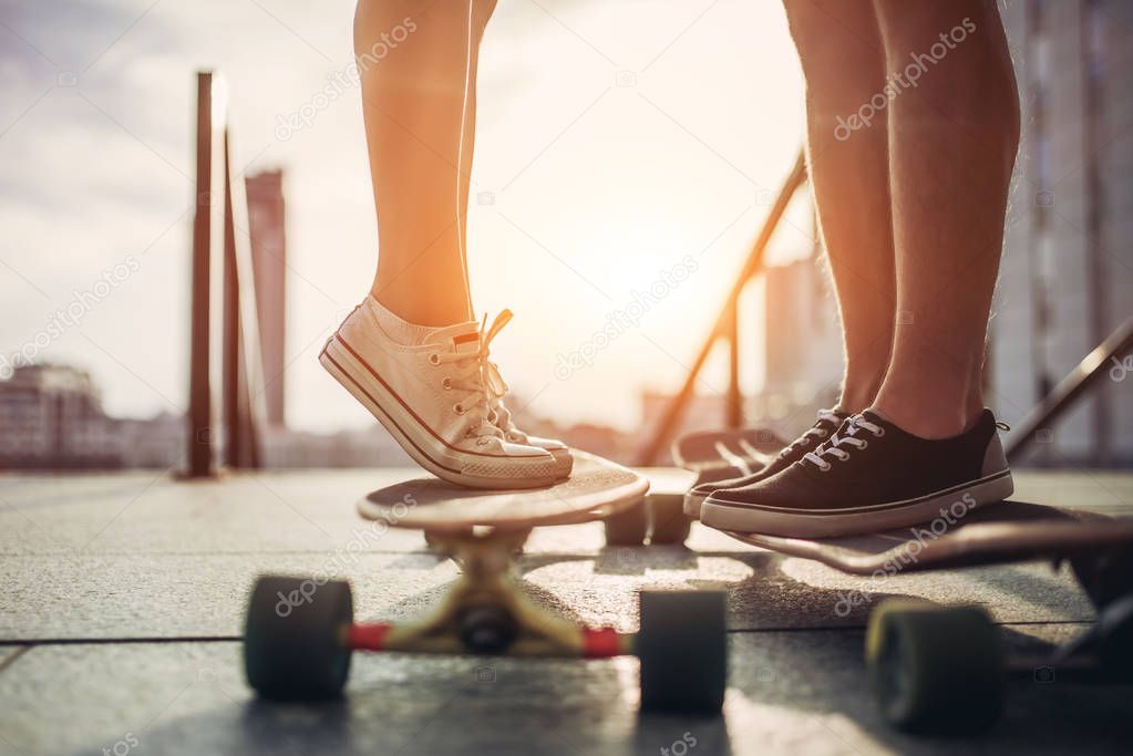 Couple with skateboards