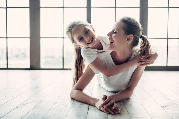 Mom with daughter at home