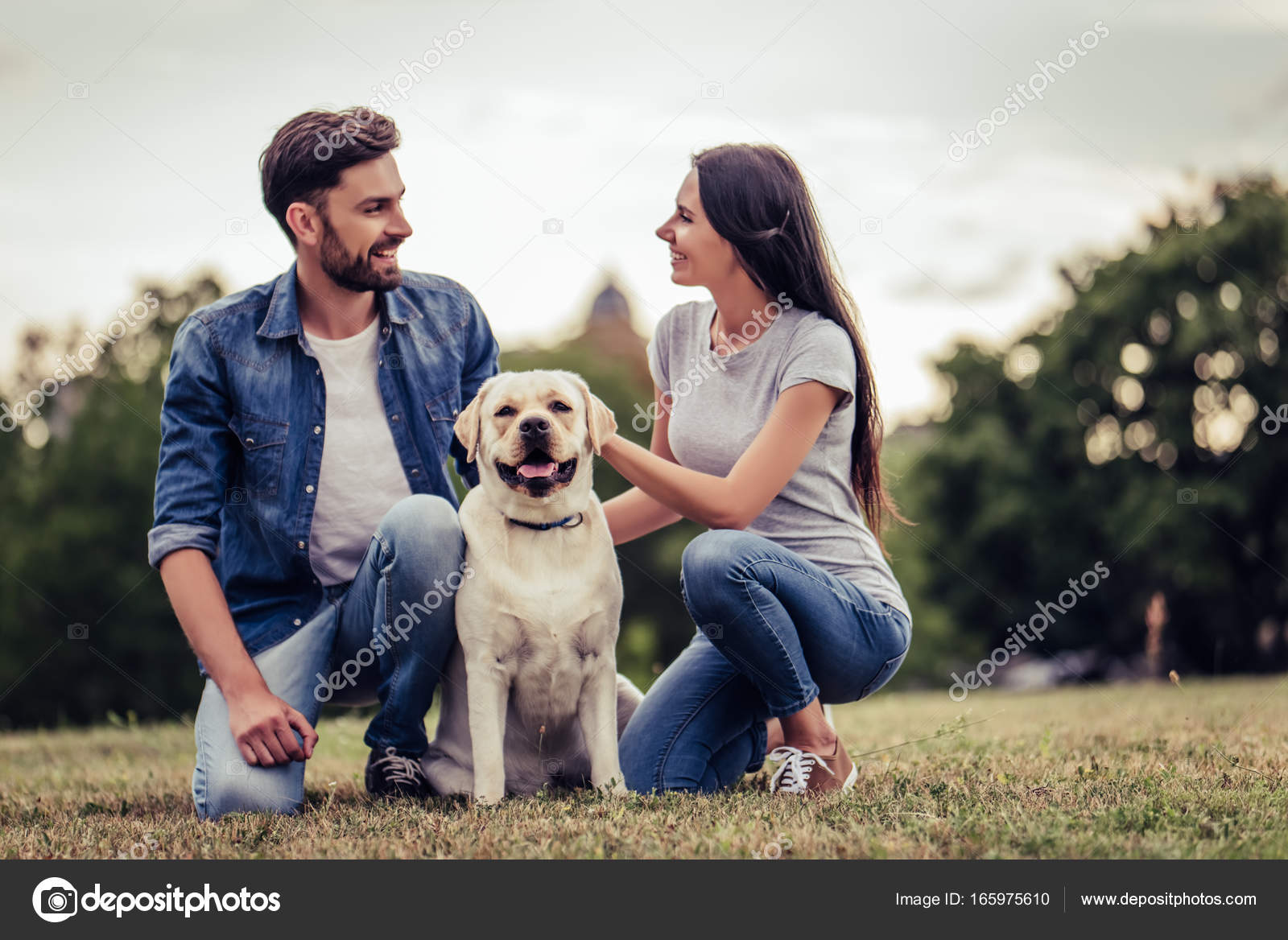 Couple with dog — Stock Photo © #165975610
