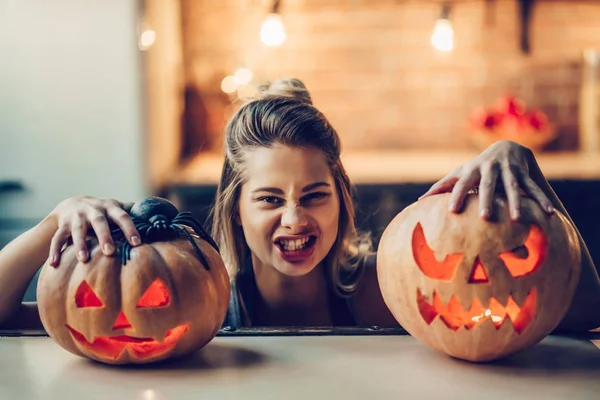 Woman with Halloween pumpkin — Stock Photo, Image