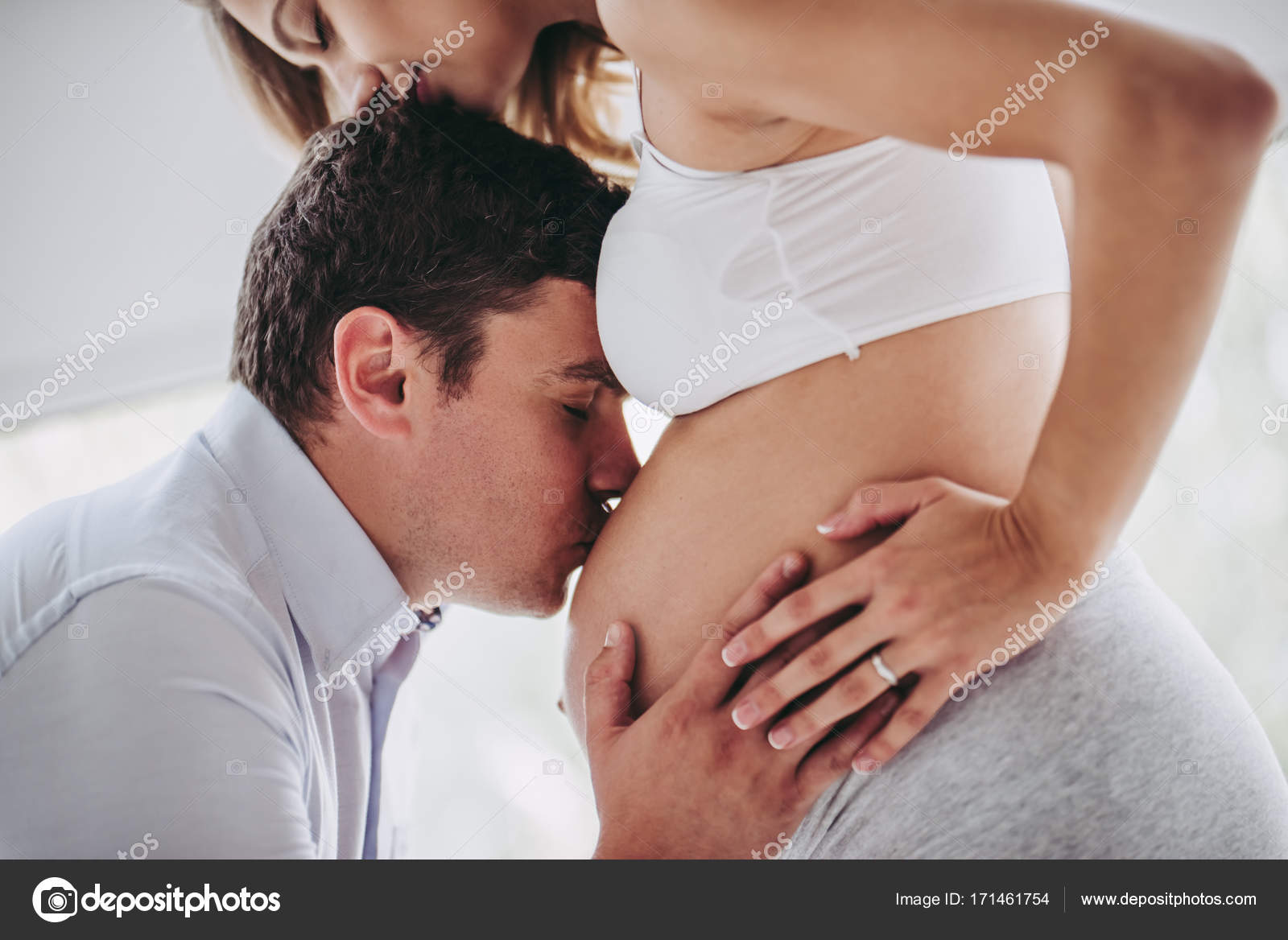 Pregnant woman with husband Stock Photo by ©4pmphoto@gmail 171461754 pic
