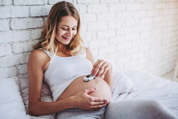 Pregnant in bed — Stock Photo, Image