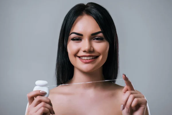 Beautiful woman on grey background — Stock Photo, Image