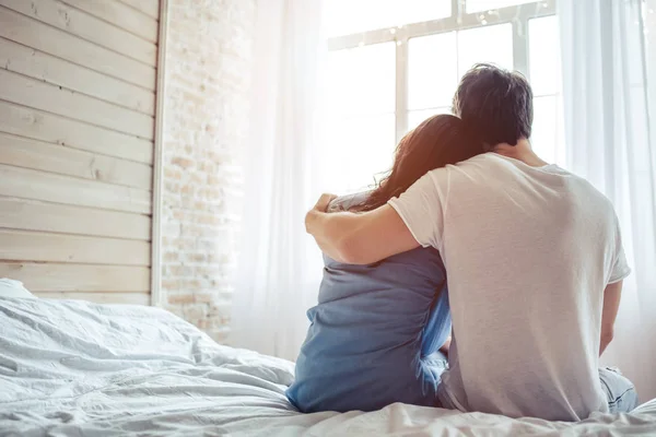 Couple in bedroom — Stock Photo, Image