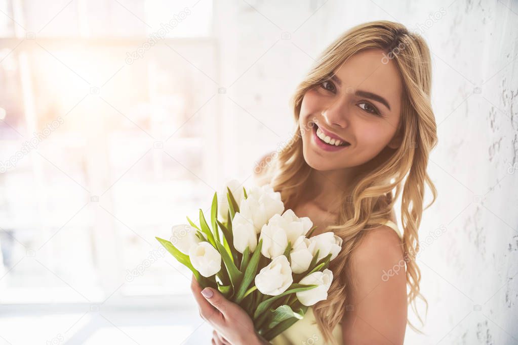 Young woman with tulips