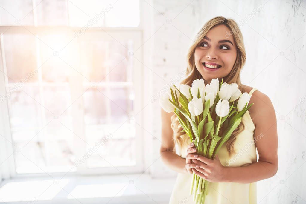 Young woman with tulips