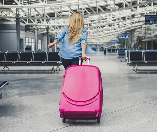 Young woman in airport — Stock Photo, Image