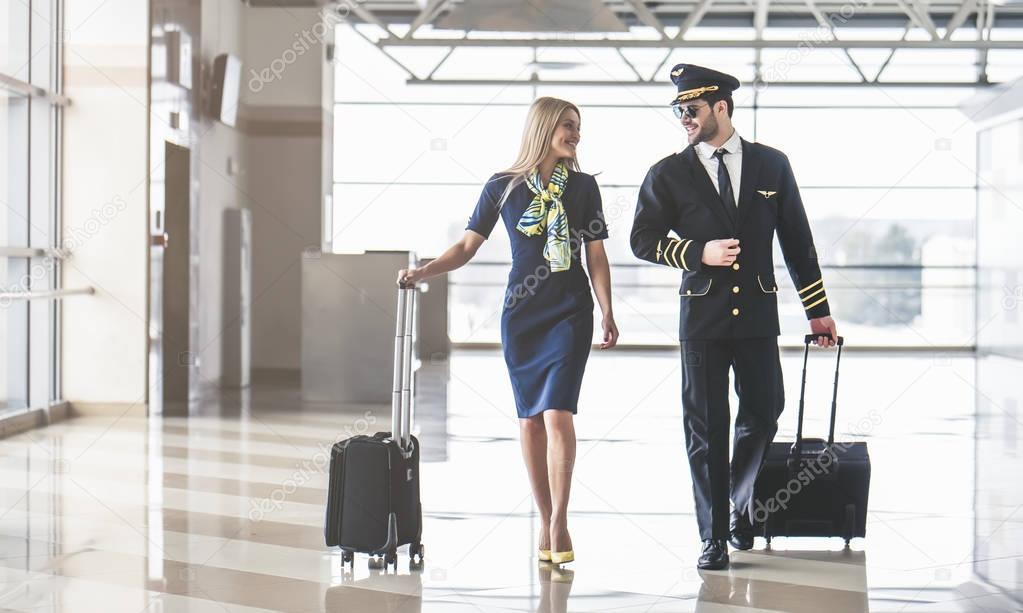 Pilot and flight attendant in airport