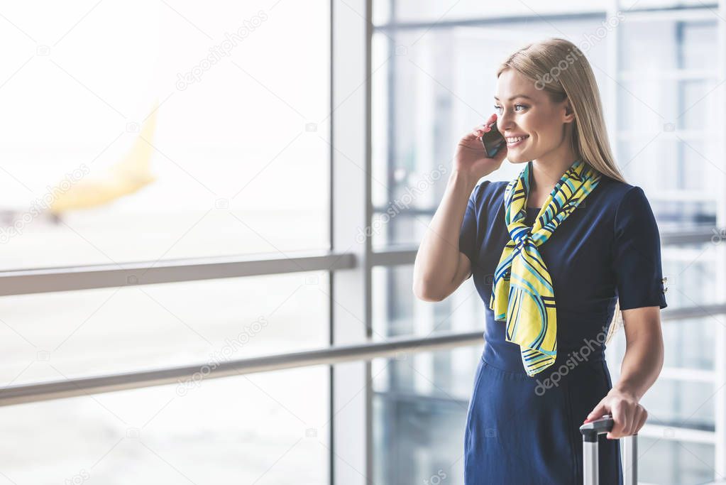 Flight attendant in airport