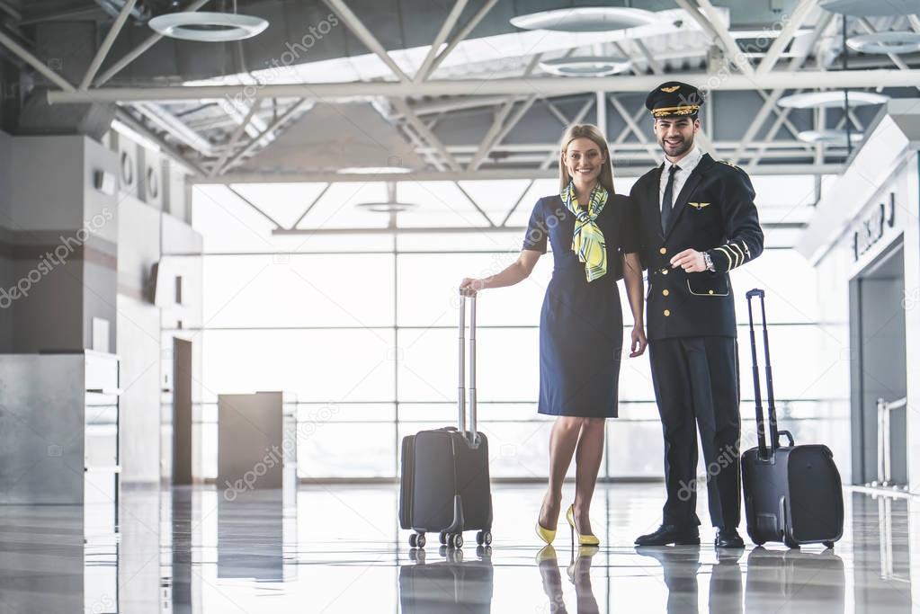 Pilot and flight attendant in airport