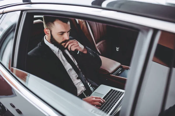 Businessman in car