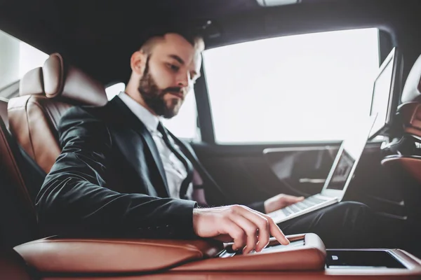 Businessman in car — Stock Photo, Image