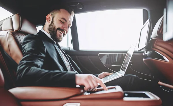 Businessman in car — Stock Photo, Image