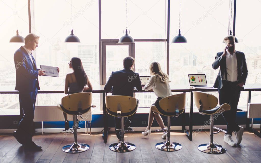 Group of people working in modern office
