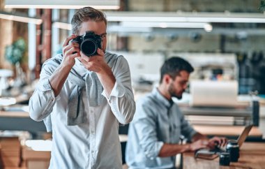 Photographers in office