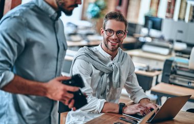 Photographers in office