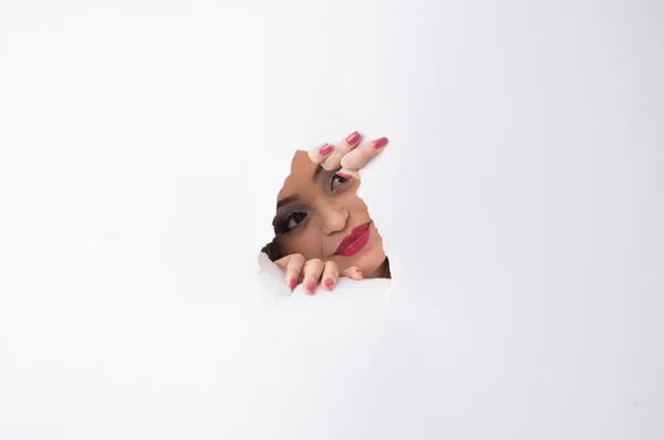 Woman Spying through the hole — Stock Photo, Image