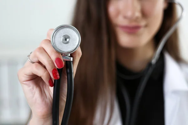 Female medicine doctor hand holding stethoscope head — Stock Photo, Image