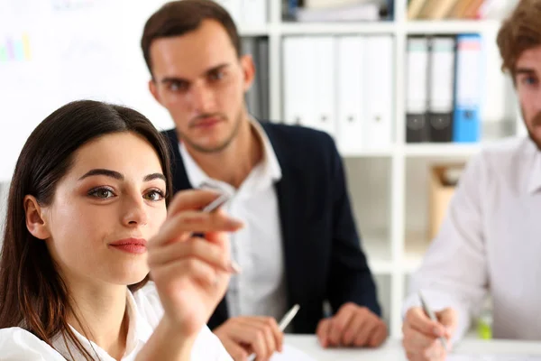 Beautiful blonde woman make some marks on screen — Stock Photo, Image