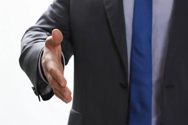 Hombre de traje y corbata dan la mano como hola en la oficina —  Fotos de Stock