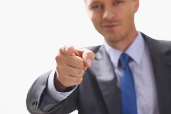 Affärsman pekar ett finger på någon som vakar ett foto — Stockfoto