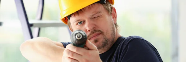 Worker using electric drill portrait — Stock Photo, Image