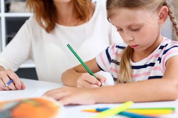 Blond smiling little girl hold in arm pencil drawing — Stock Photo, Image